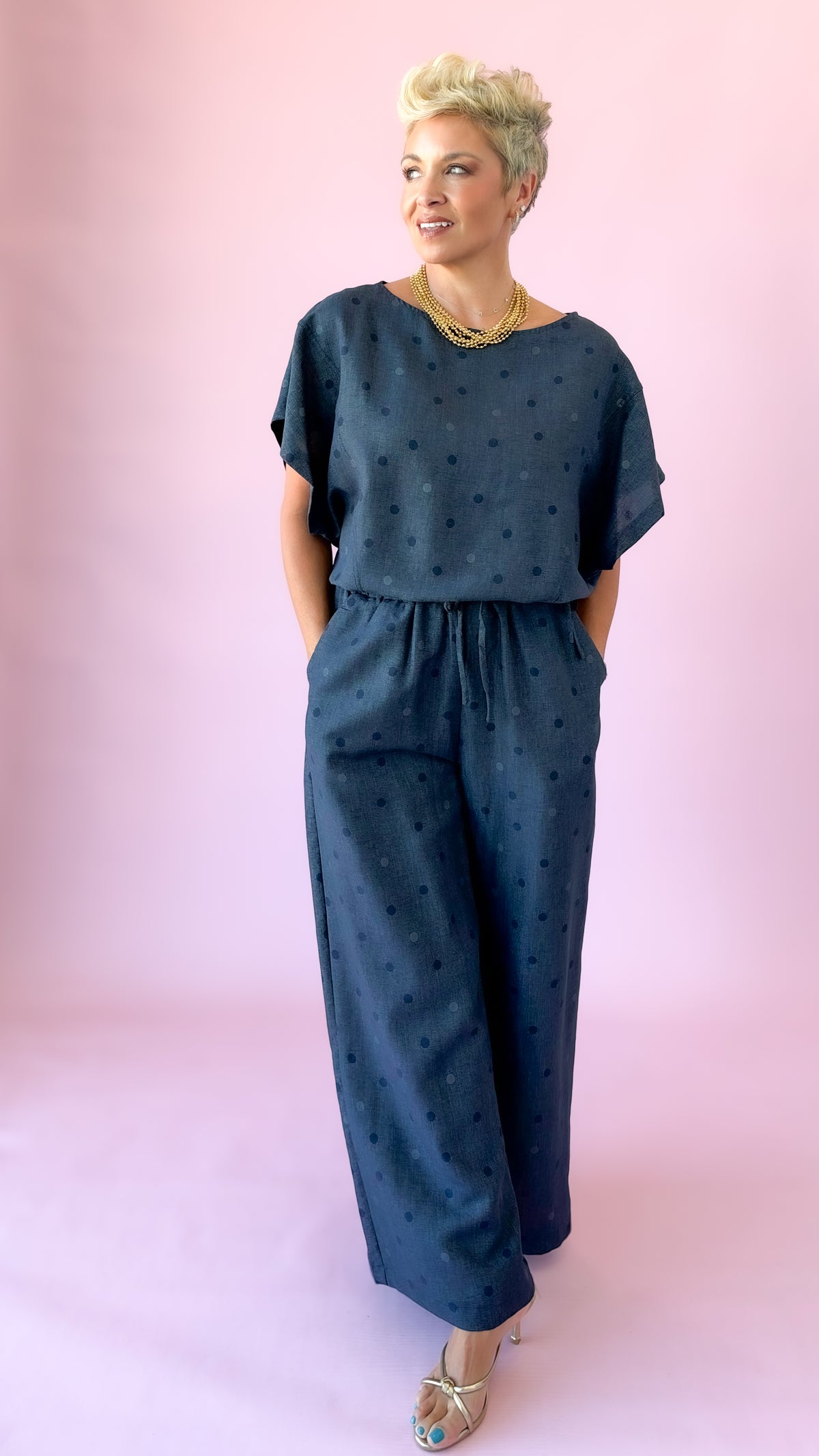 Full-length view of indigo wide-leg polka dot pants set
