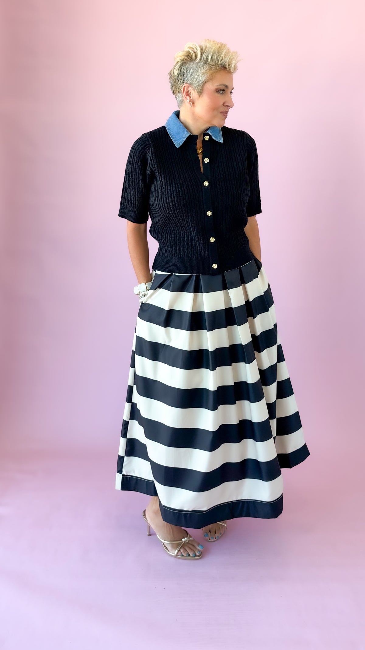 Black and white striped pleated midi skirt with a denim-collar knit top