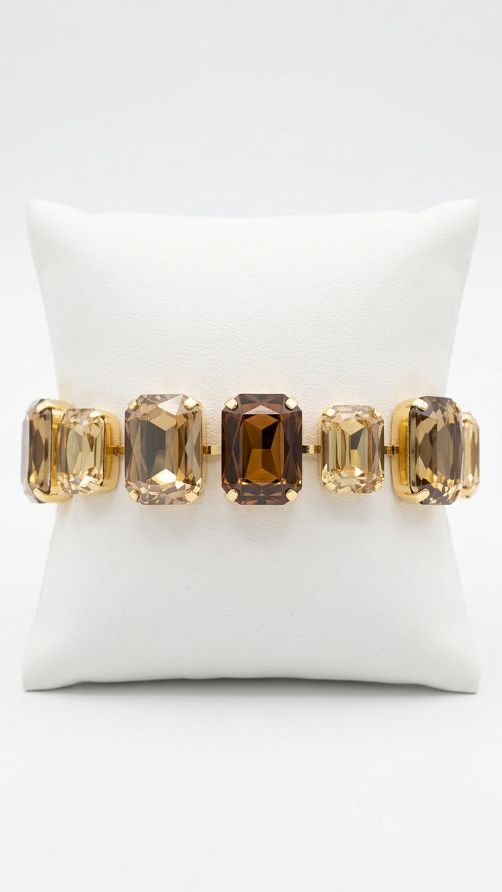 Large rectangle brown tone rhinestone bracelet with gold metal.
