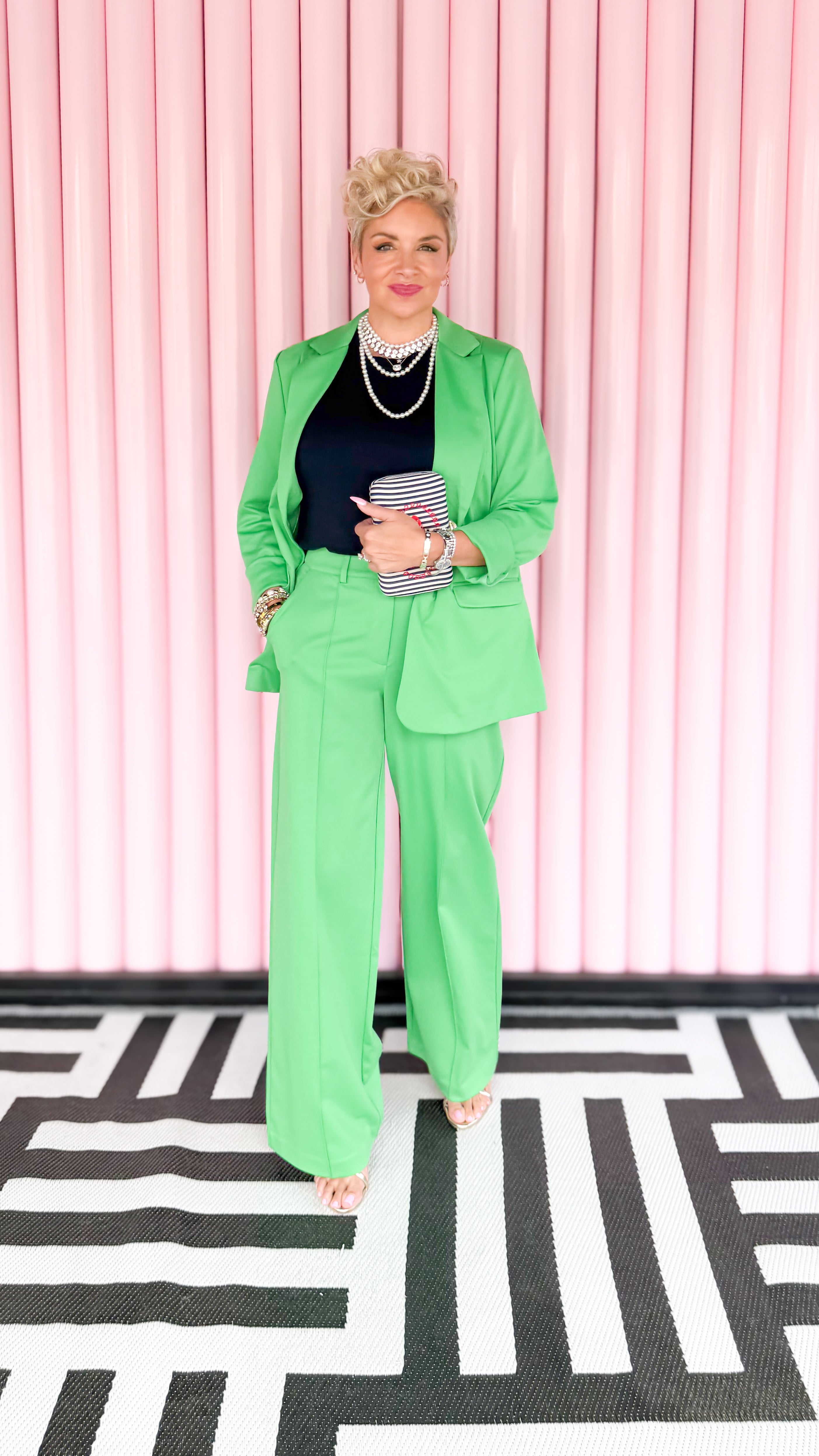 Knit trouser with center pintuck in green worn on model - side view - BLVD Boutik