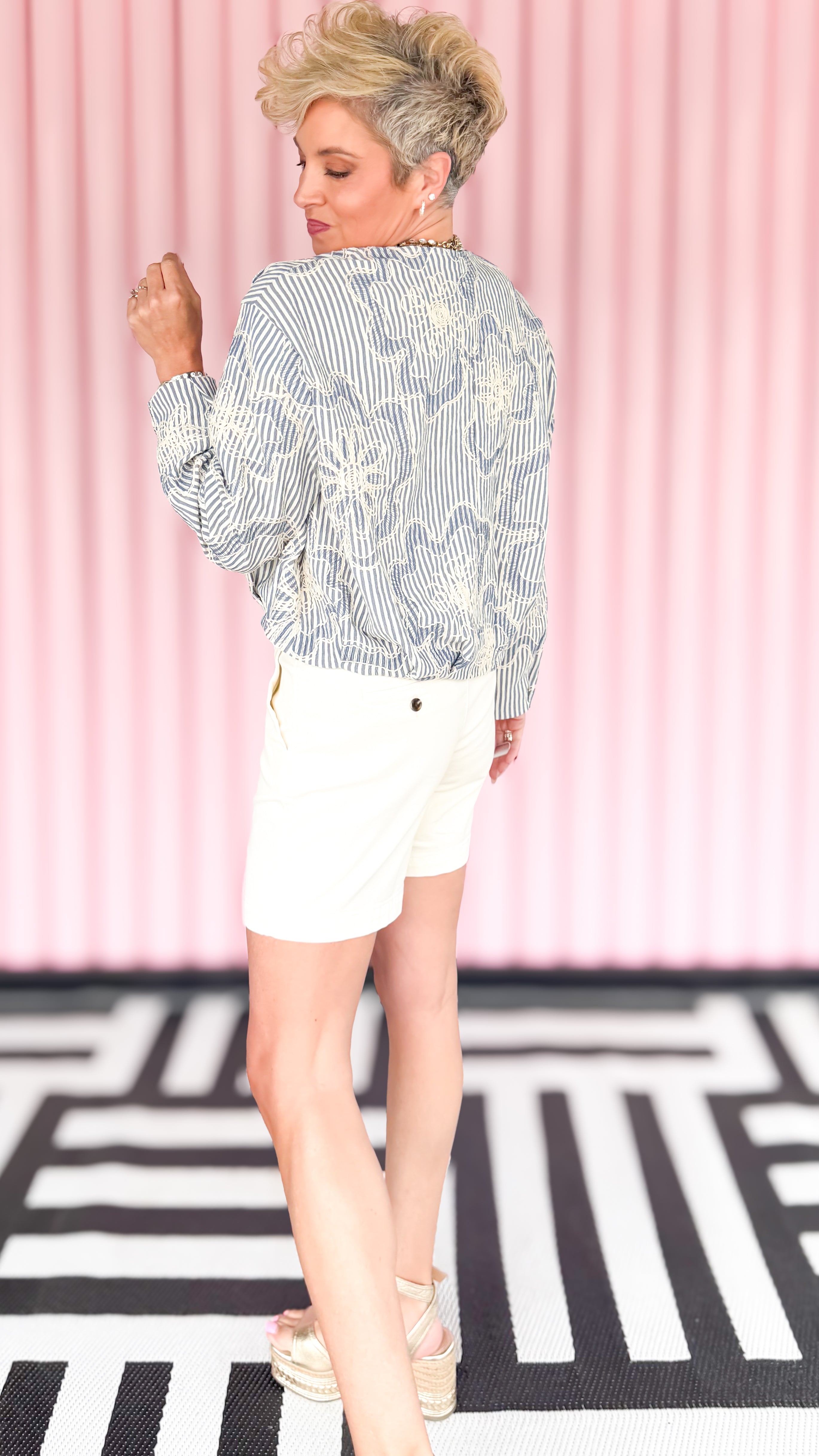 Embroidered seersucker jacket in blue worn on model - side view - BLVD Boutik