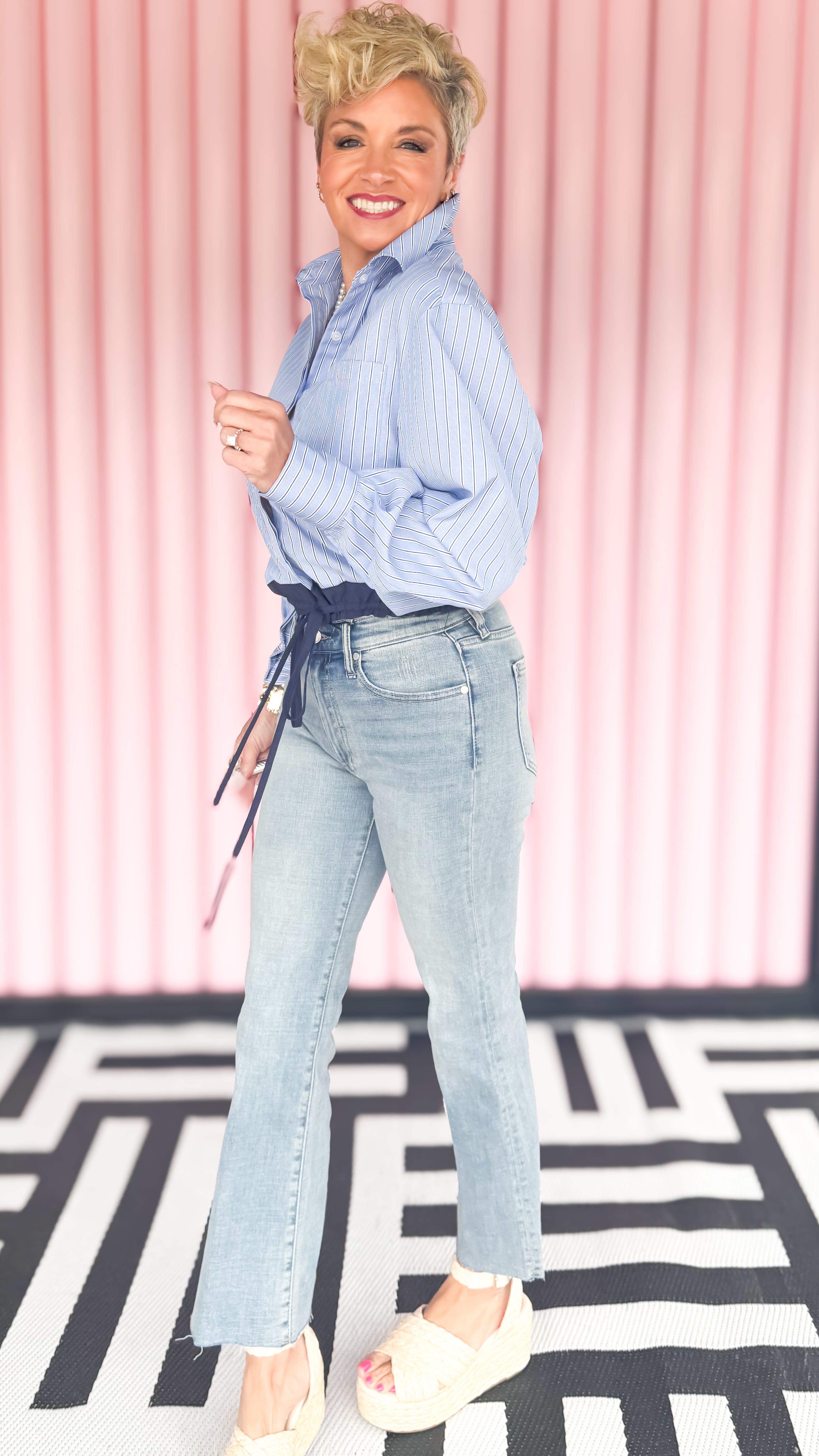 Striped top with tie waist in blue worn on model - styled view - BLVD Boutik