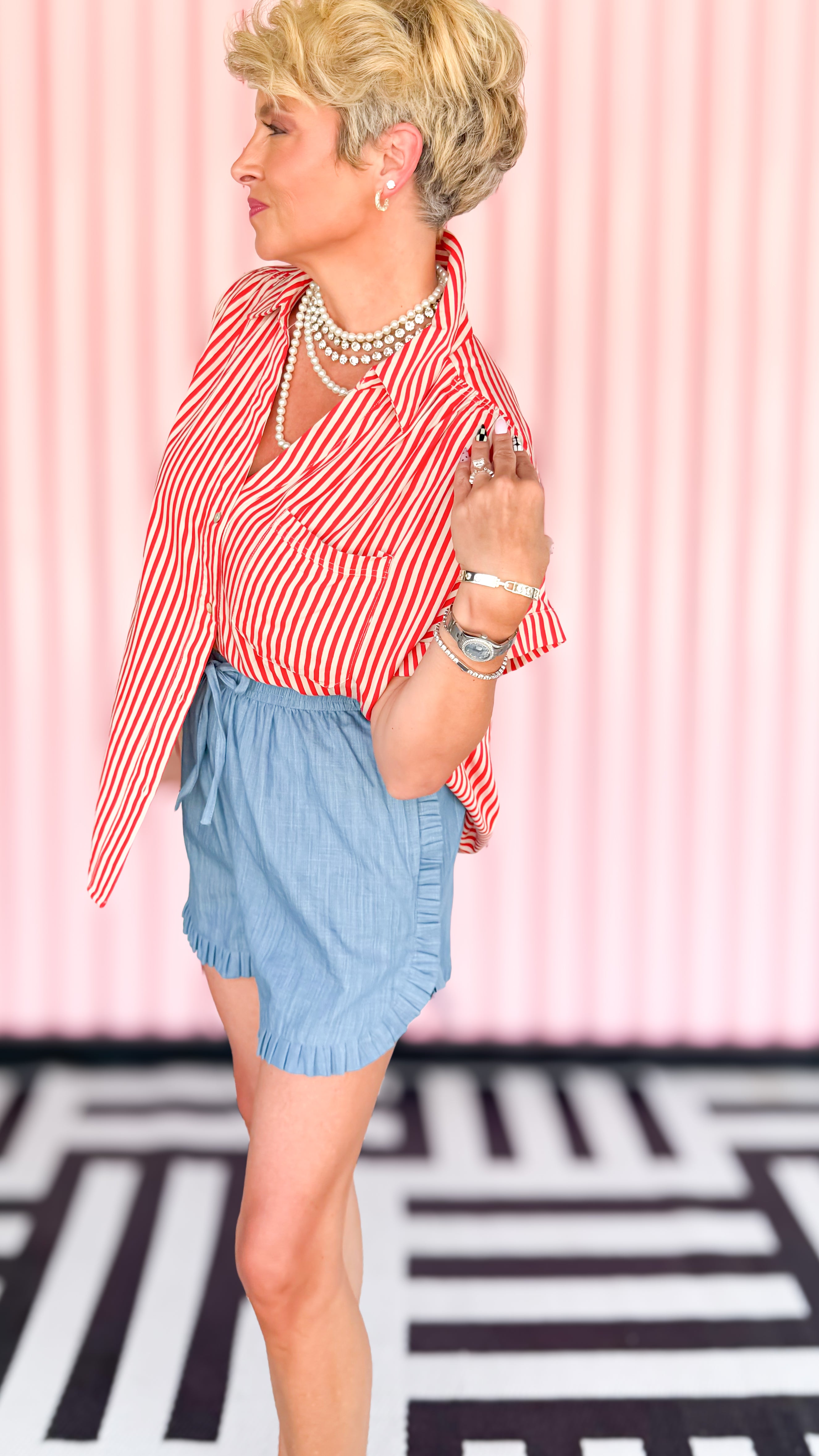 Collared roll-up sleeve top in red worn on model - styled view - BLVD Boutik