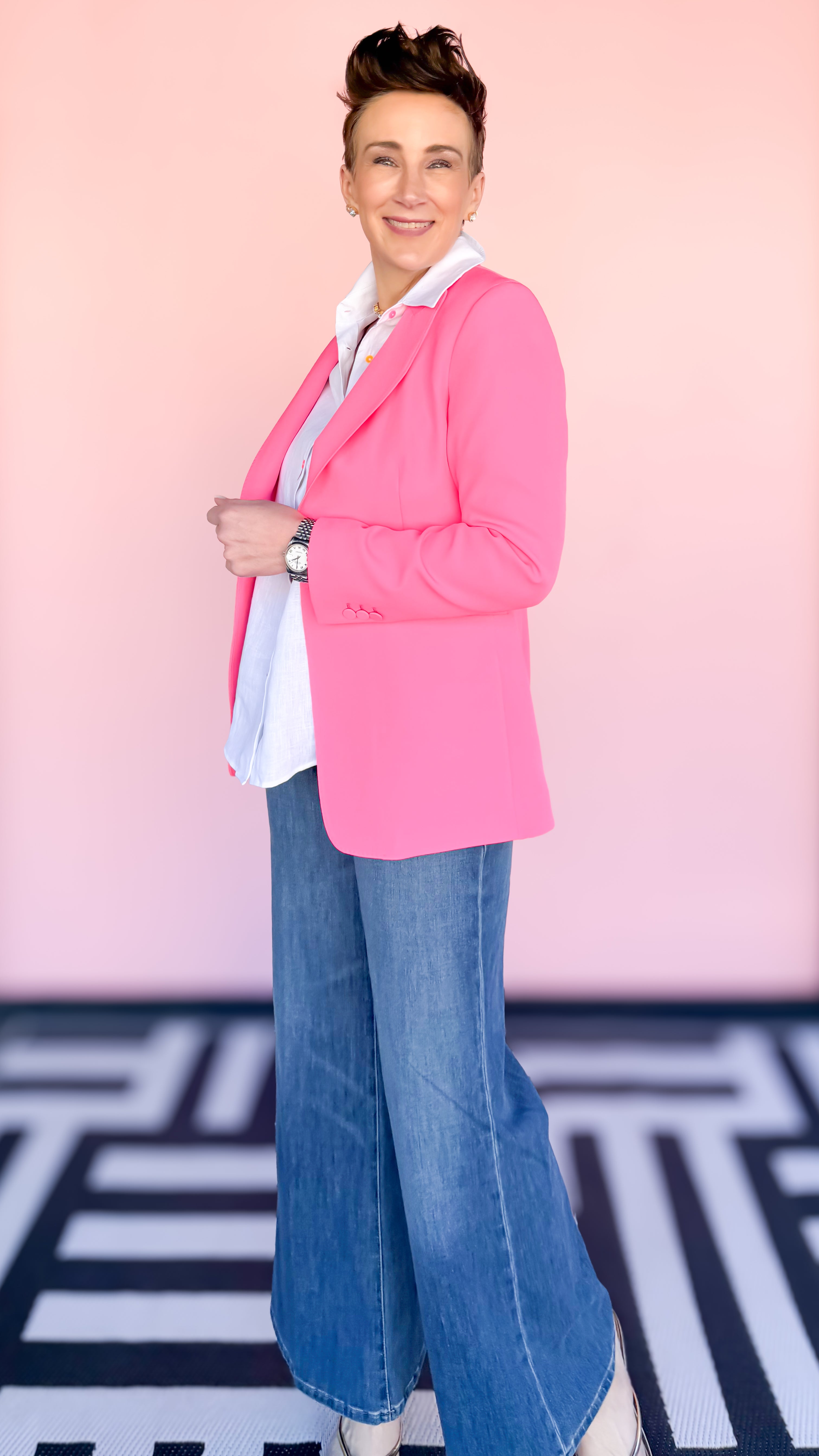 Fuchsia blazer with floral lining worn on model - side view - BLVD Boutik
