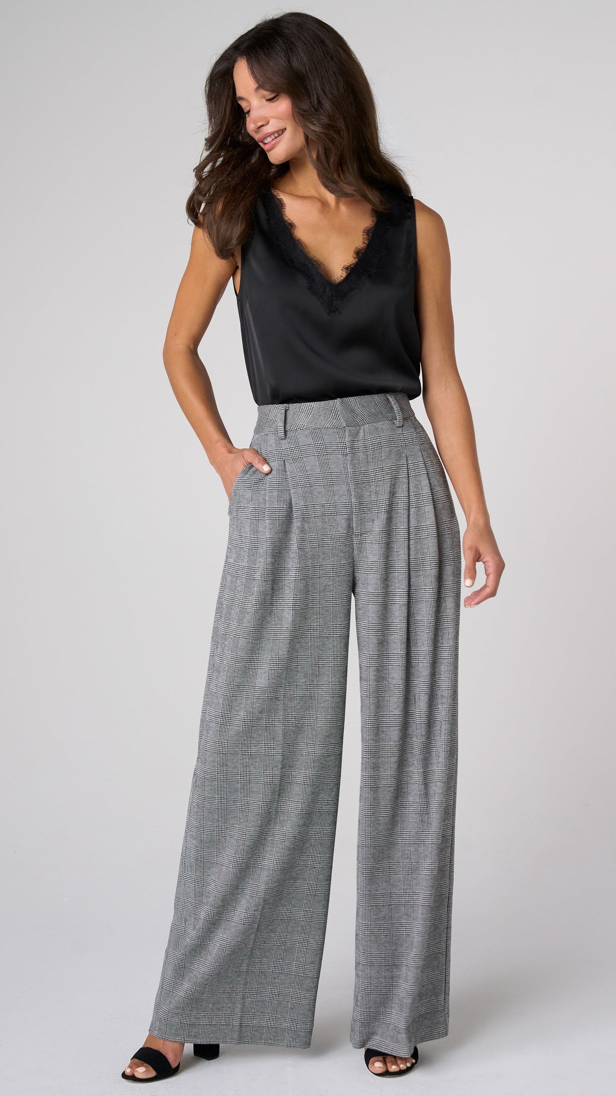 Full-length front view of Brooke high rise wide leg trousers in black and white glen plaid