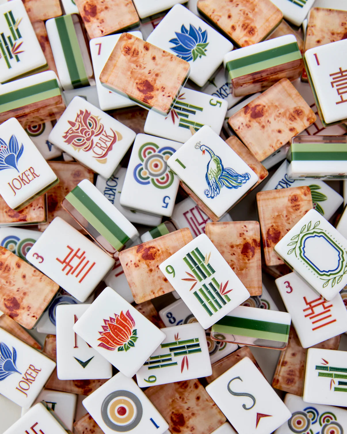 Collection of assorted Mahjong tiles with various symbols and numbers.