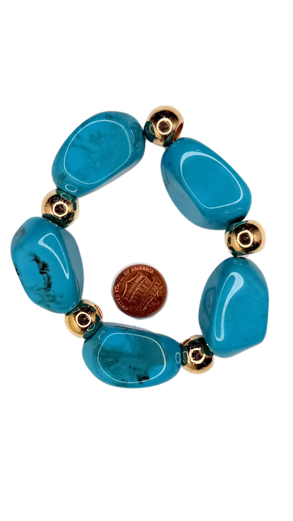 Turquoise beaded bracelet with gold accents on a white background