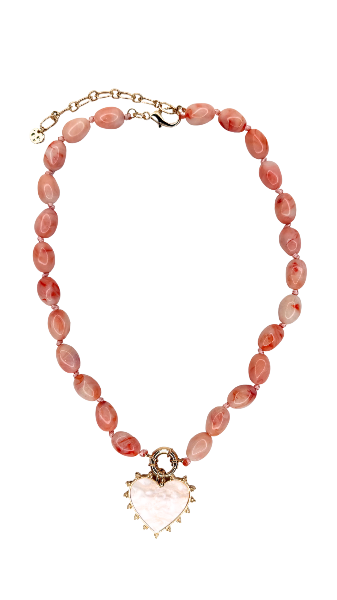 Necklace with pink beads and a heart-shaped pendant on a white background
