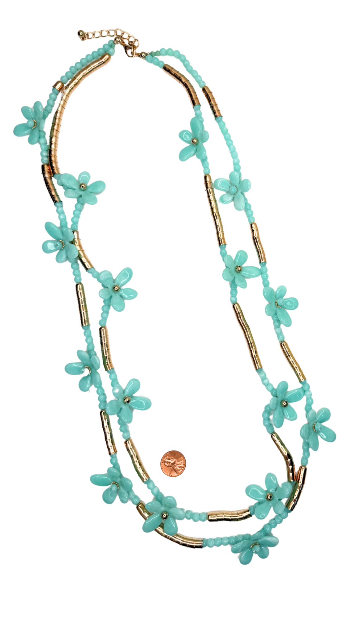 Turquoise beaded necklace with gold accents on a white background