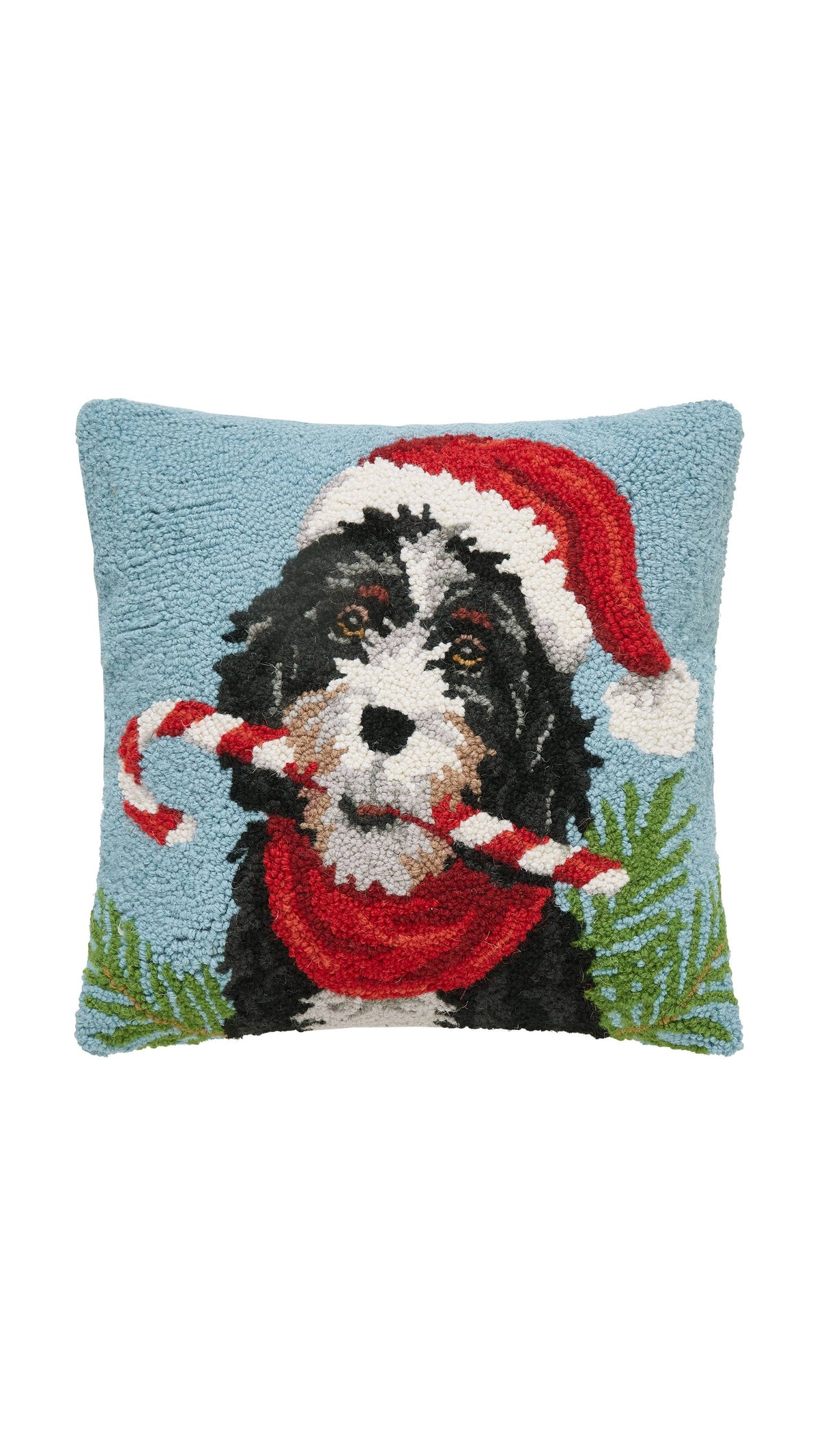 Hooked wool Christmas pillow of a Bernedoodle, full view on white