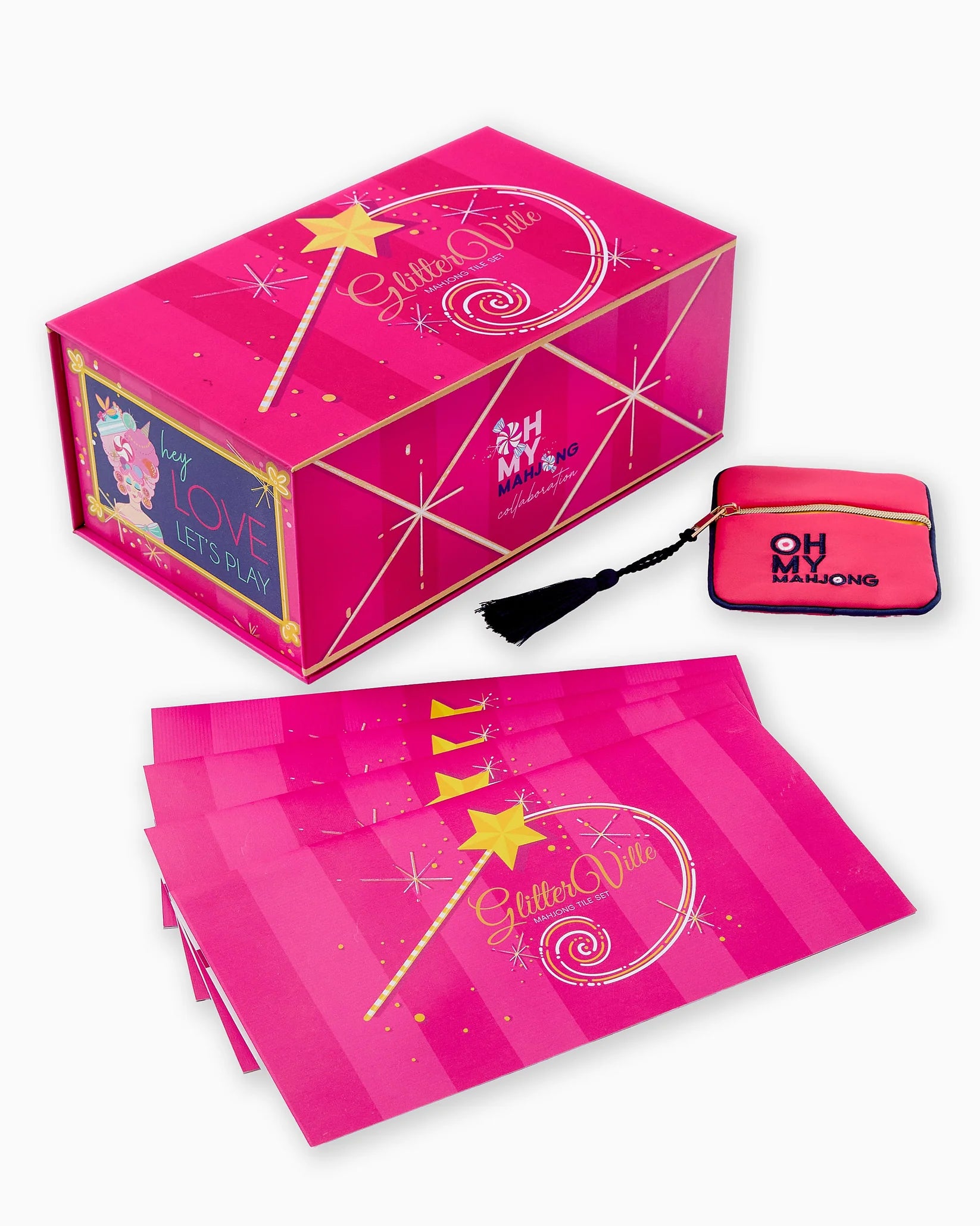 Pink 'Glitterville' product set with packaging and accessories on a white background