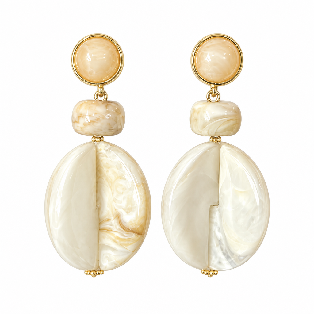 Cream lucite ball statement earrings on white background