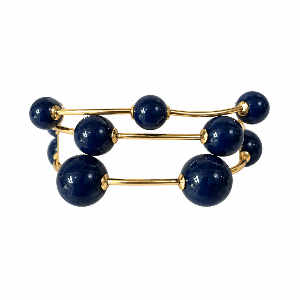 Blue three-strand bracelet on solid white, first view
