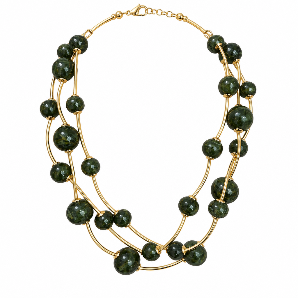 Dark green multi-strand necklace alone on solid white