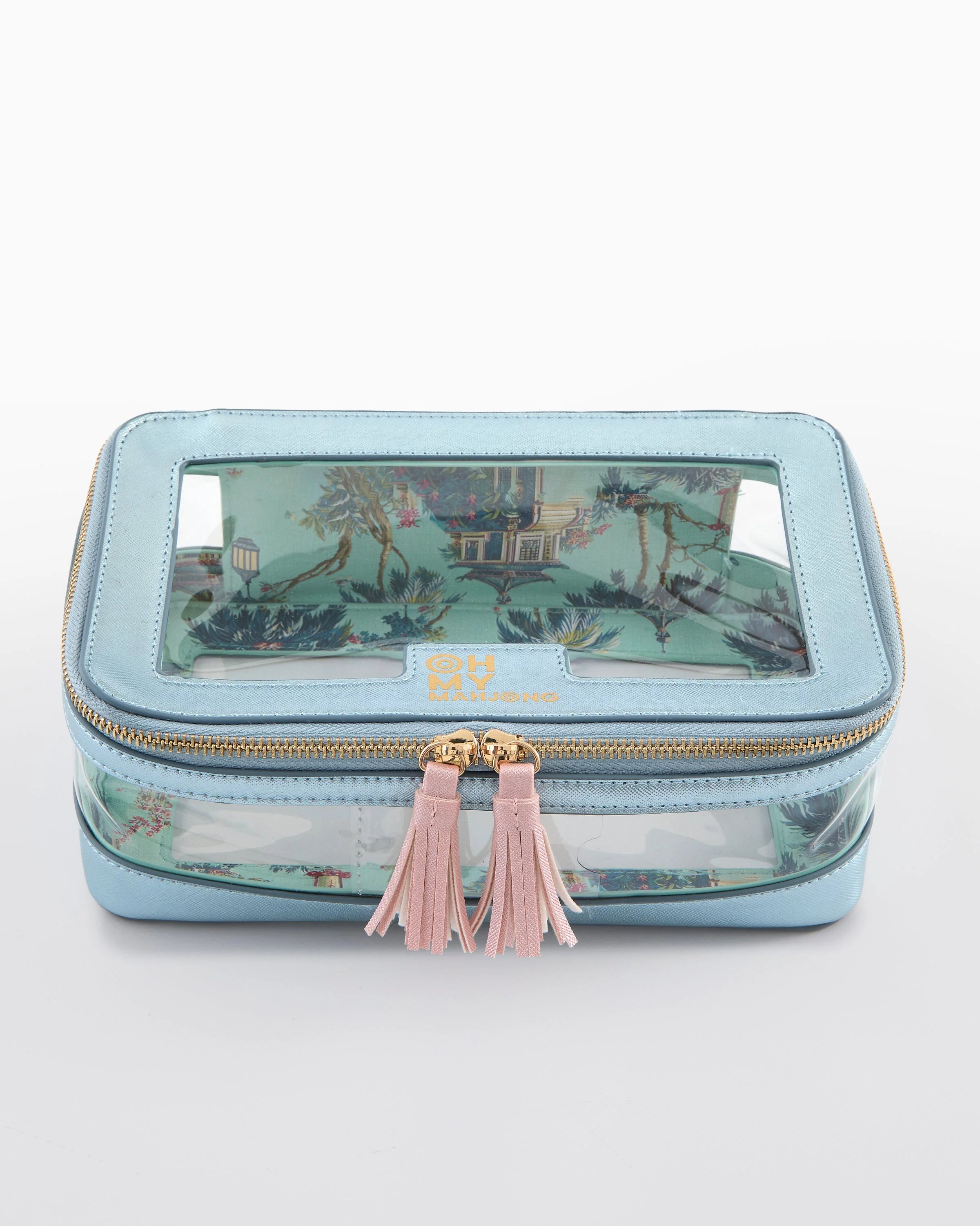 Light blue jewelry box with tassels on a white background