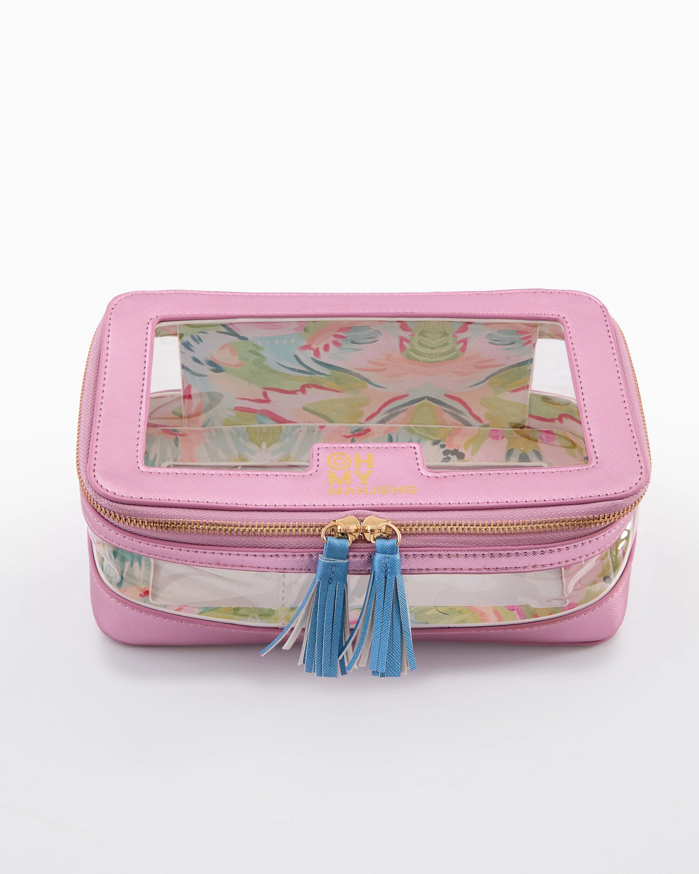 Pink jewelry box with floral pattern and blue tassels on a white background