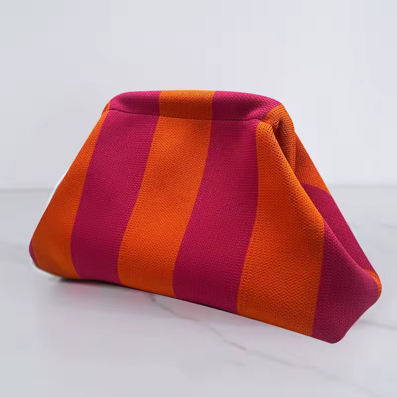 Dumpling striped clutch accessory - side view - BLVD Boutik