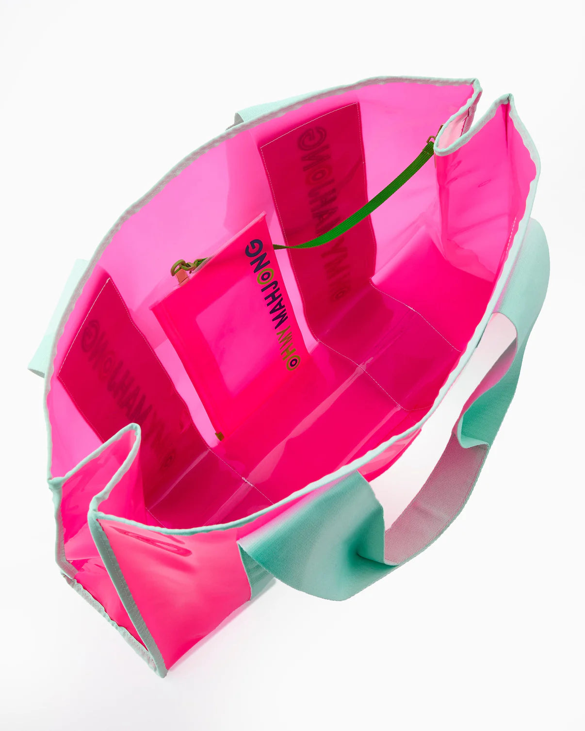 Pink and green plastic container with a handle on a white background