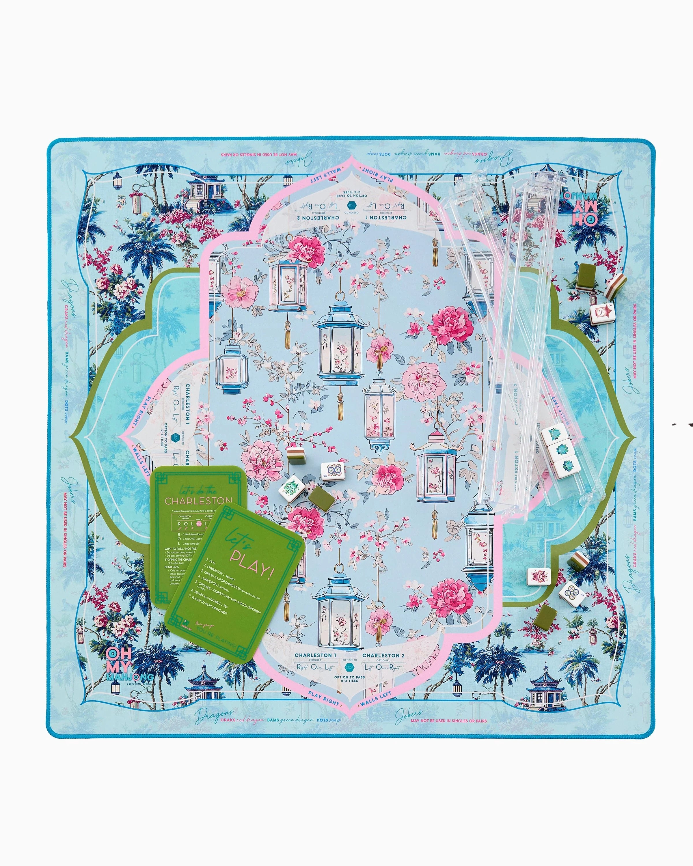 Decorative board game mat with floral and lantern design on a white background