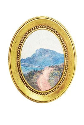 Collection of gold-framed pictures with various scenes on a white background