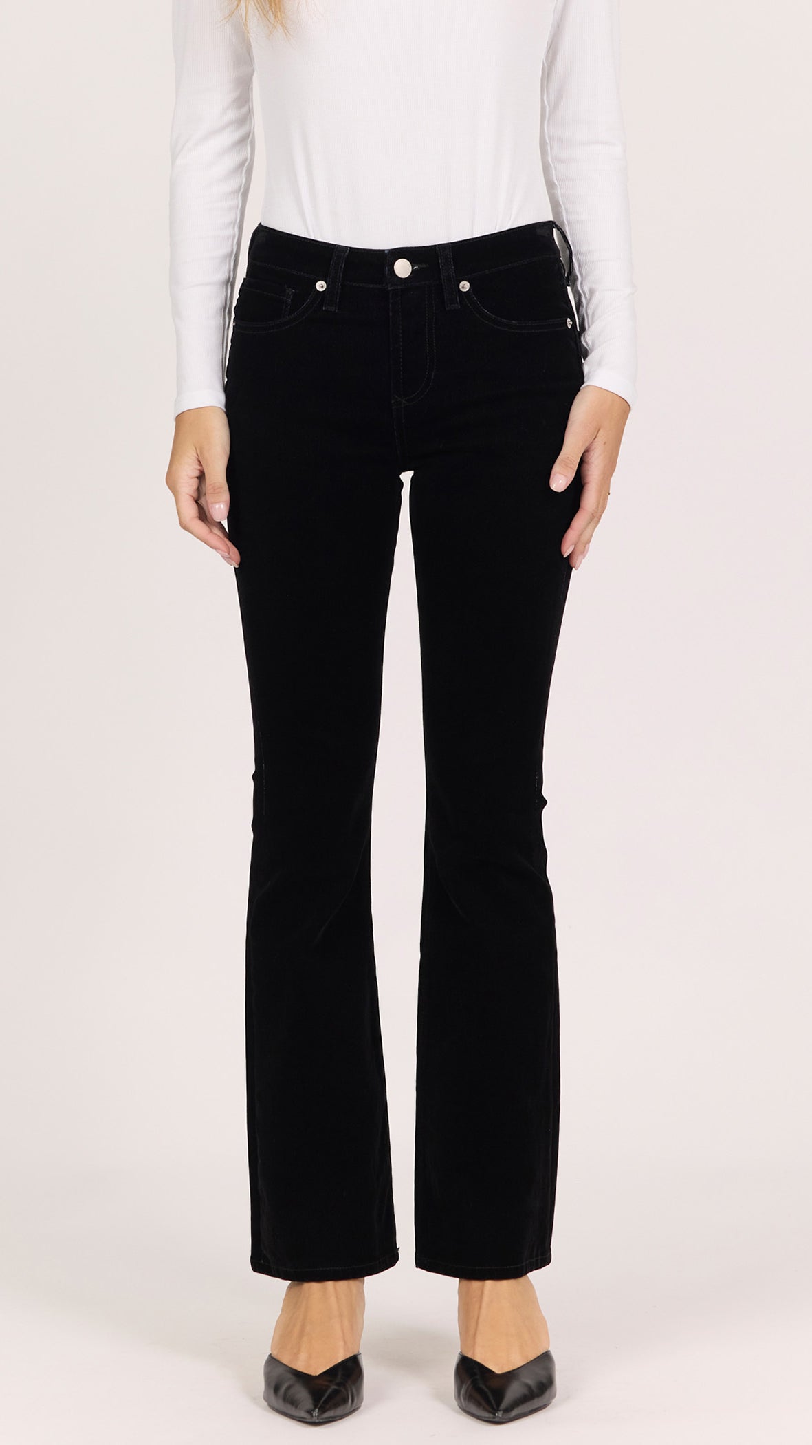 Front view of black dahlia velvet Jaxtyn bootcut pants showing the five-pocket styling and button closure