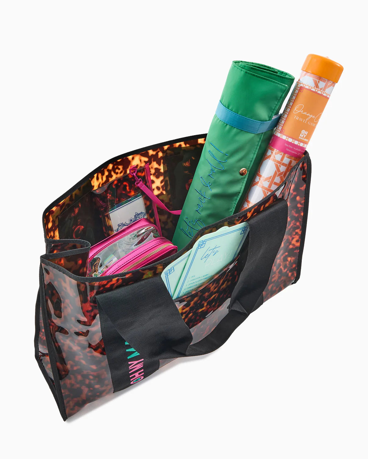 Leopard print tote bag with a yoga mat, water bottle, and other items on a white background