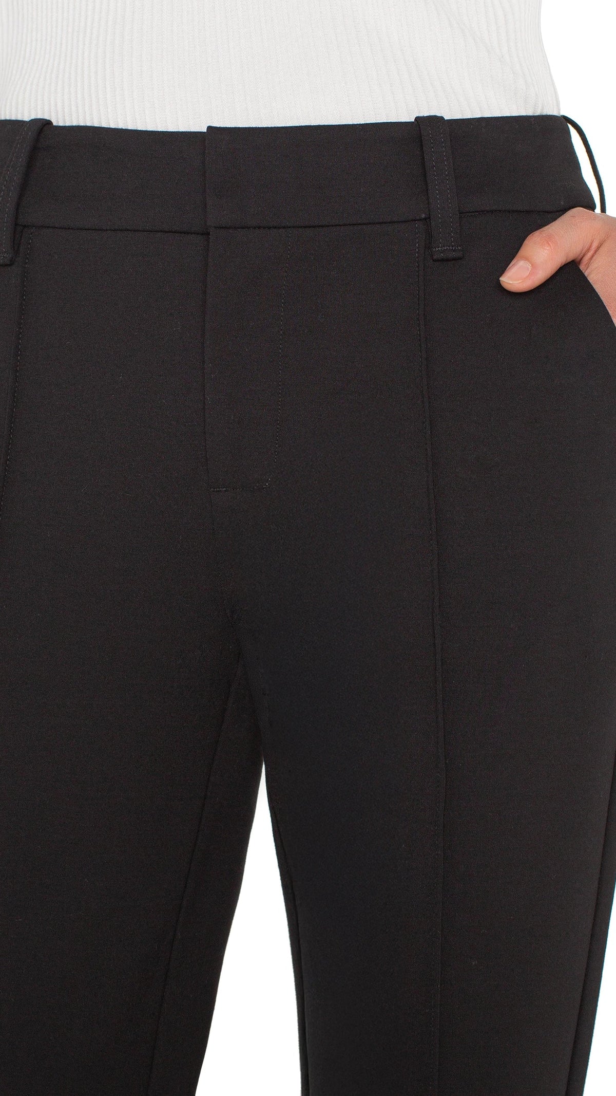 Close-up of waistband and slant pocket on black Gemma trousers