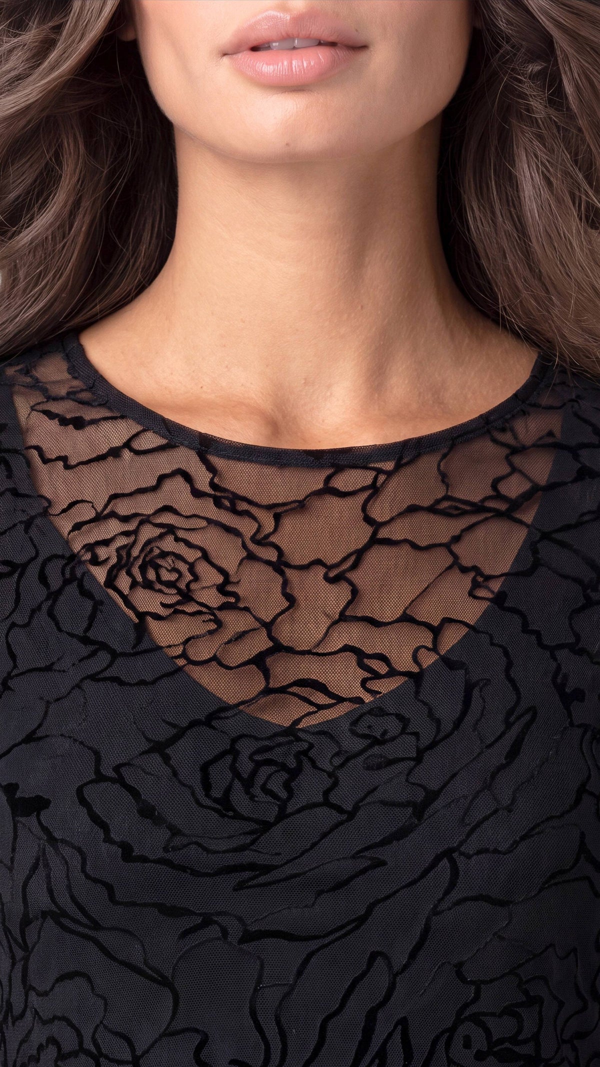 Close-up of sheer mesh crew neck with tonal rose embroidery over a scoop-neck lining